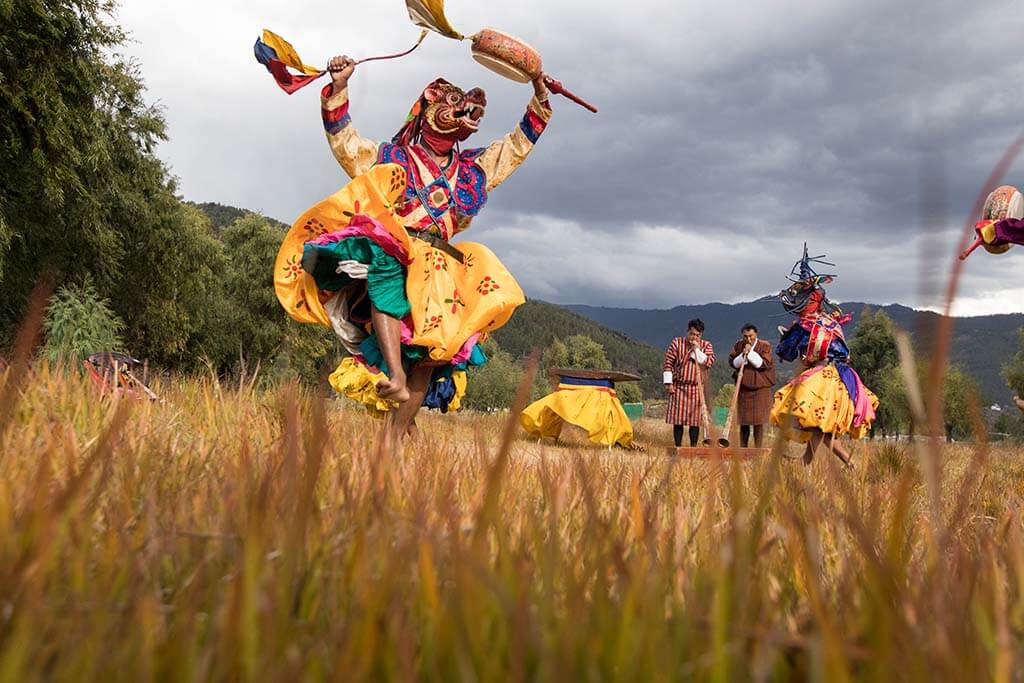 Masked dancer celebrates in Bhutan