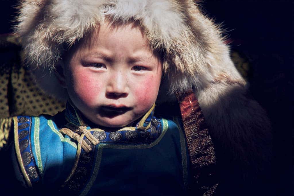 Mongolian boy with fur hat