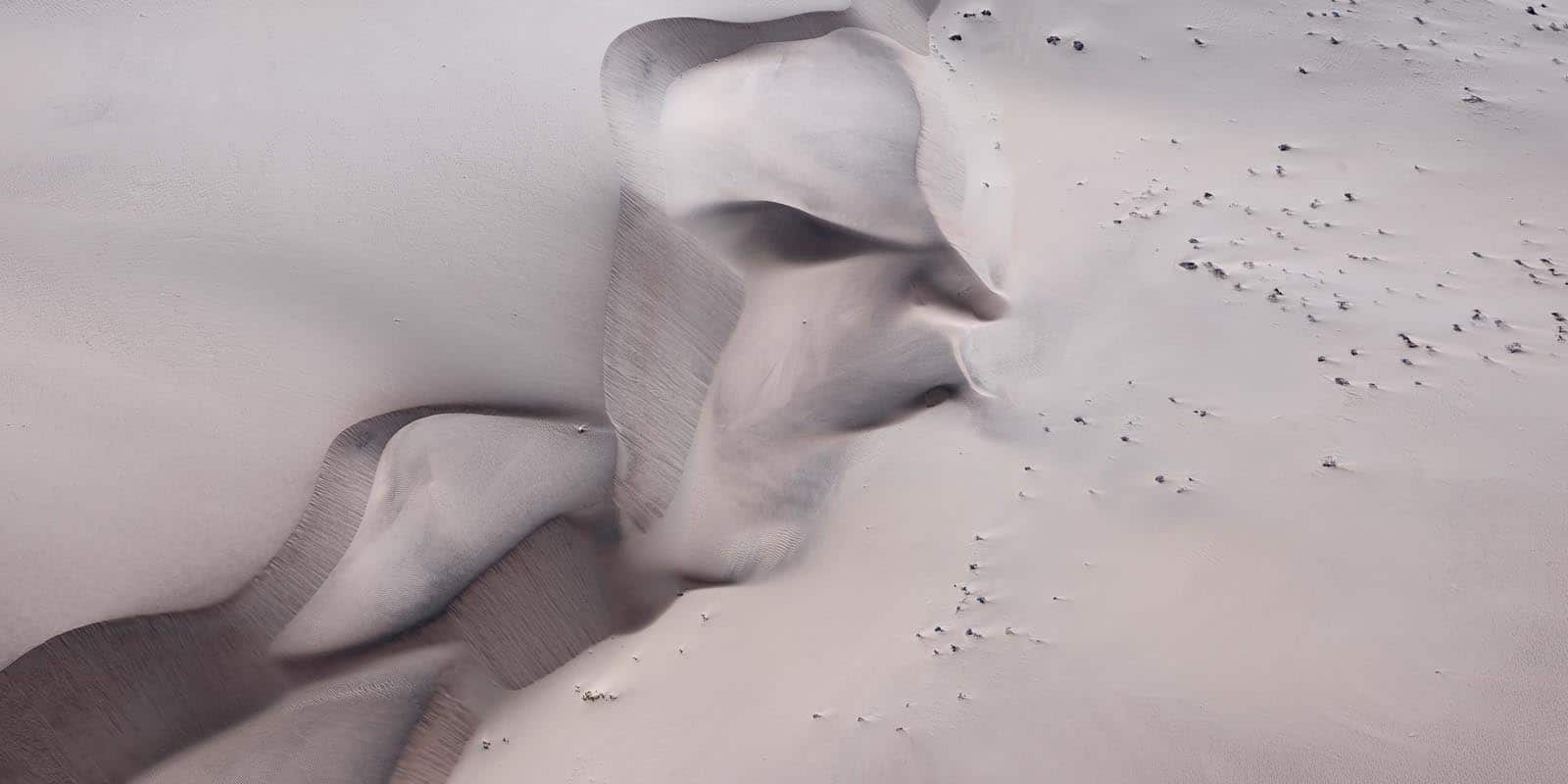 sand forms different texture in Namibia by Tom D. Jones