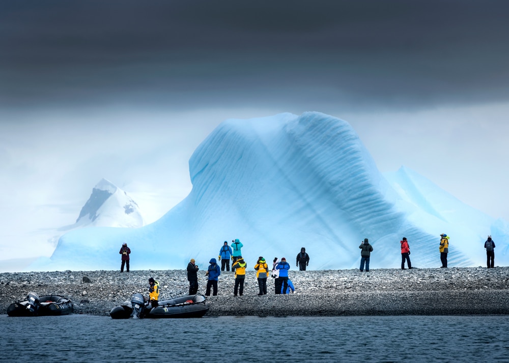 photographers landed and took pictures of iceberg